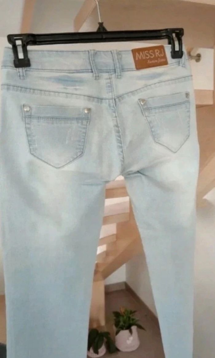 Jeans a troues - photo numéro 4