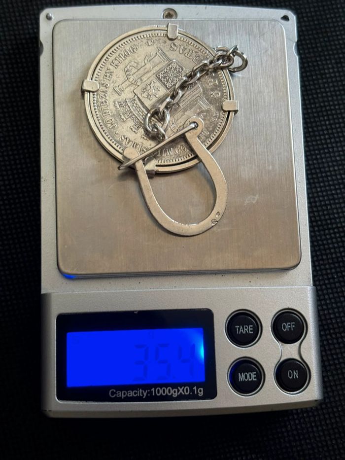 Beau porte-clé en argent avec pièce de 5 pesetas en argent TBE - photo numéro 8