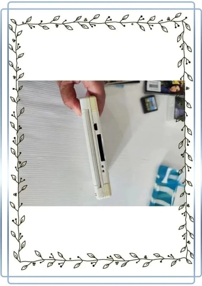 Lot nintendo ds avec une nintendo blanche en bon état mais il y'a des traces + 3 jeux - photo numéro 10