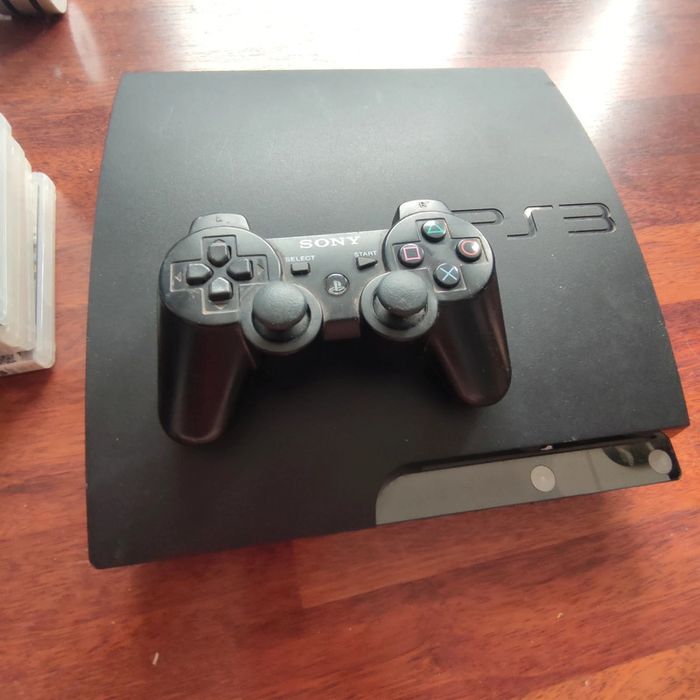 Console PS3 slim avec 10 jeux - photo numéro 3
