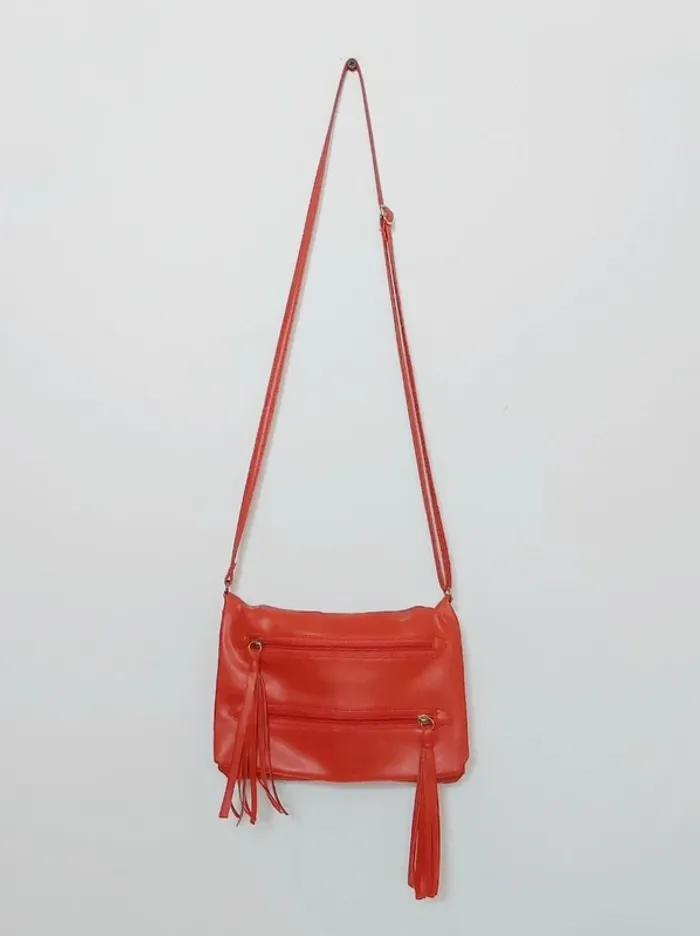 Pochette bandoulière corail pompon effet cuir vintage
