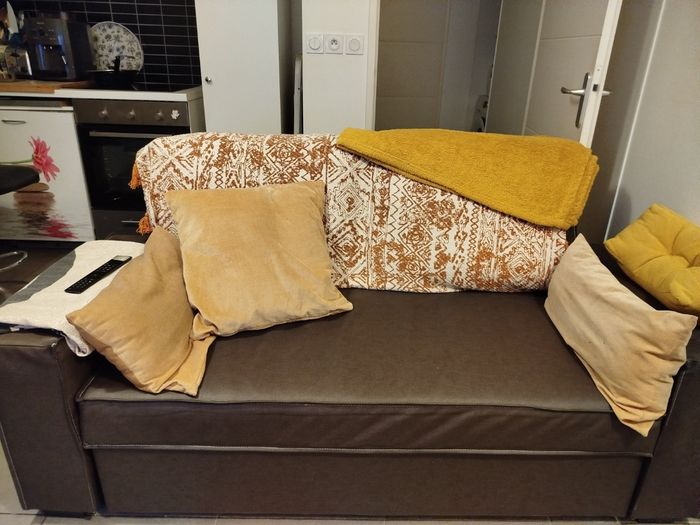 Canapé convertible aspect cuir