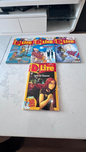 Lot de 4 magazines DLire – Romans, BD, Jeux – État satisfaisant