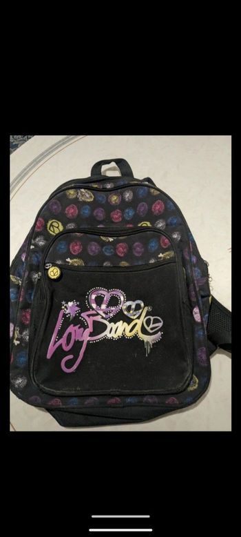 Cartable, sac à dos scolaire noir et multicolore.