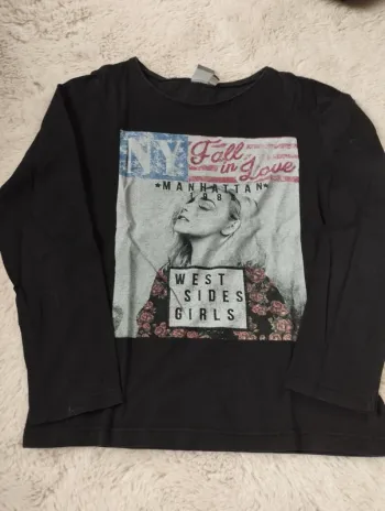 Tee shirt noir à visage 10 ans