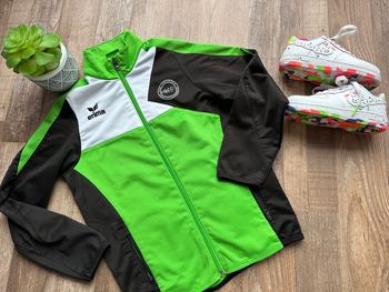 - Veste de sport Erima - 8 ans - Très bon état 