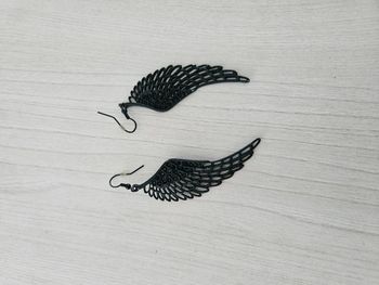 Boucle d'oreille aile d'ange