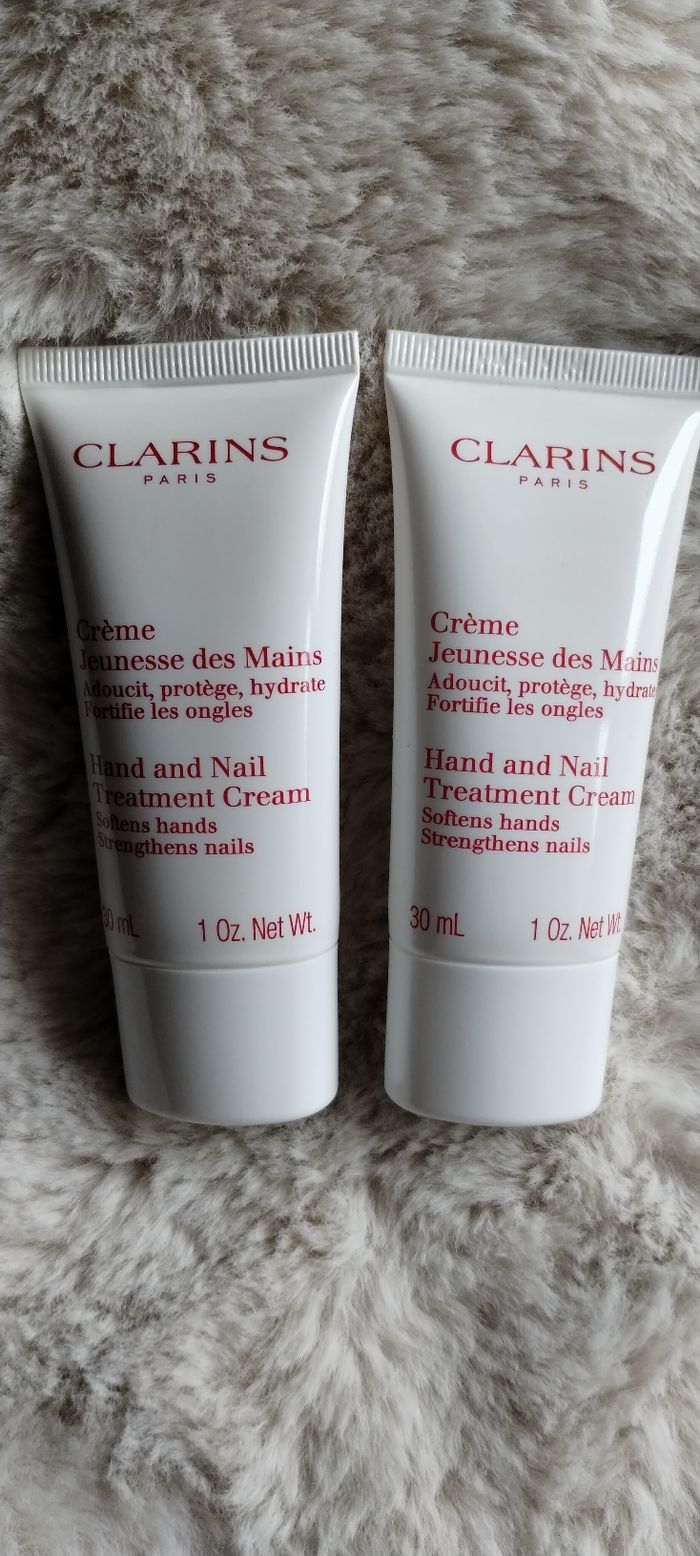 2 crèmes mains Clarins