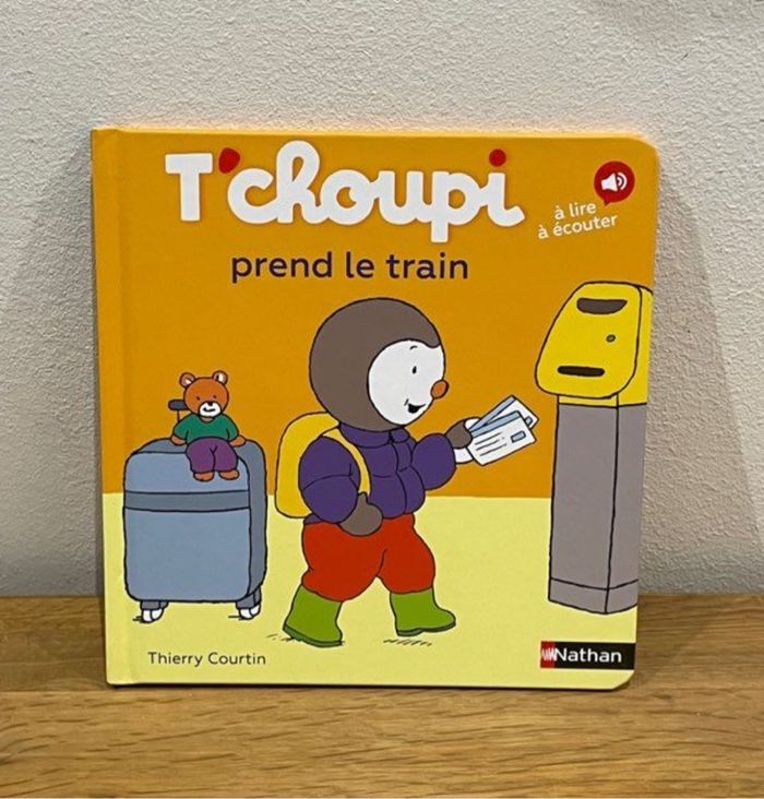 Livre tchoupi prend le train