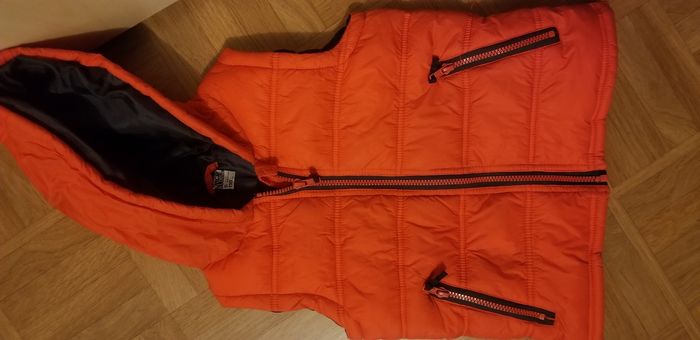 Gilet tape à l'oeil