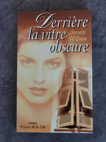 Derrière la vitre obscure Par Wilson