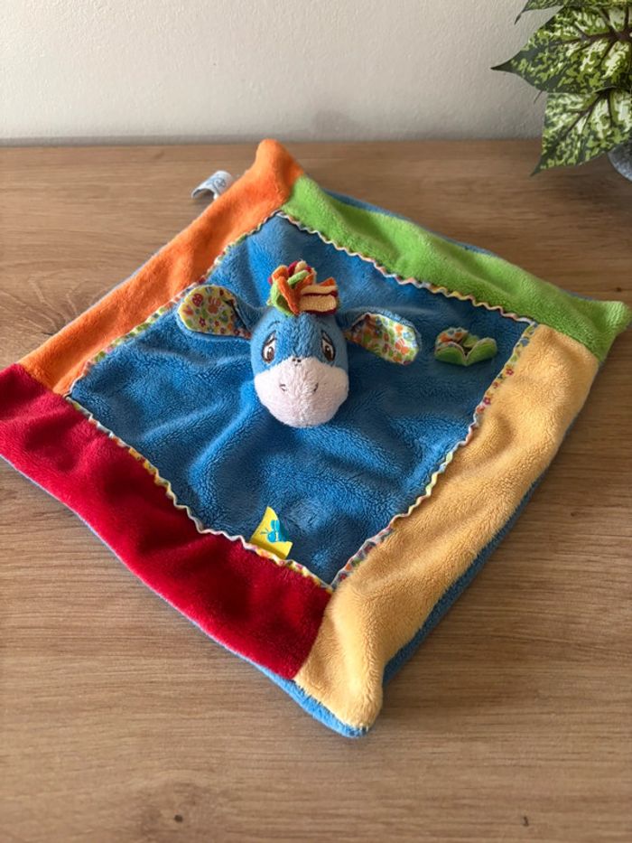 Doudou plat âne bourriquet bleu orange rouge fleur abeille Disney - photo numéro 2