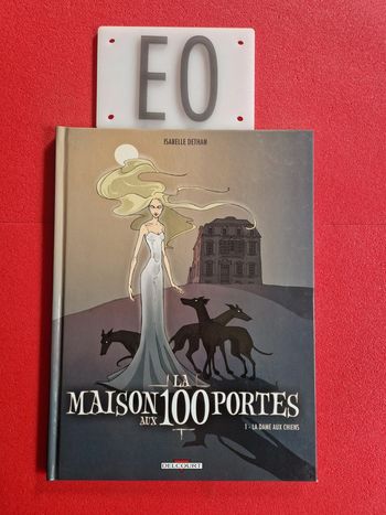 Bd la maison aux 100 portes 1,EO