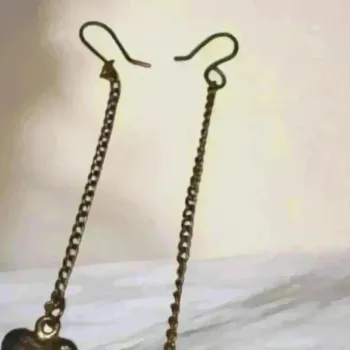 Boucles d’oreilles pendantes dorées - Cœur