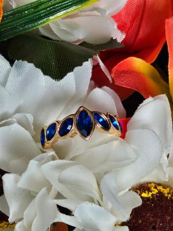 Bague avec ses pierres topaz bleue