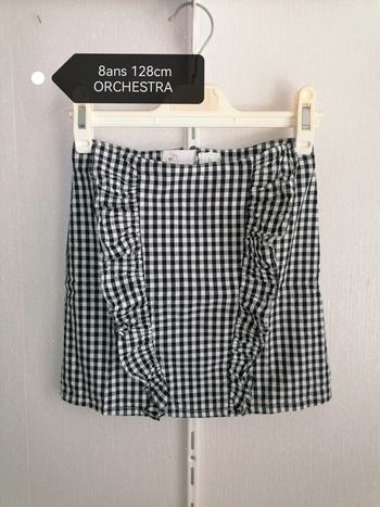 Jupe noire et blanche 8ans 128cm Orchestra