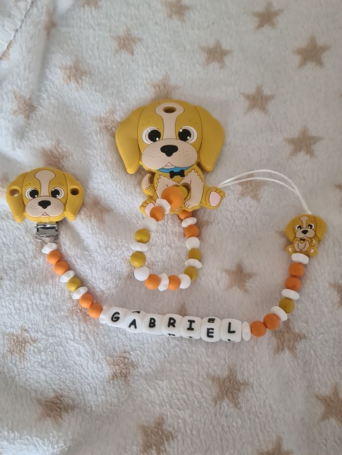 Lot attache et anneau de dentition