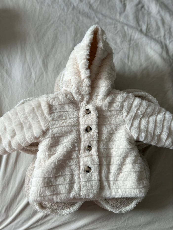 Manteau fausse fourrure