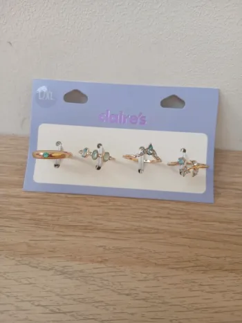 4 bagues doré Claire's neuves