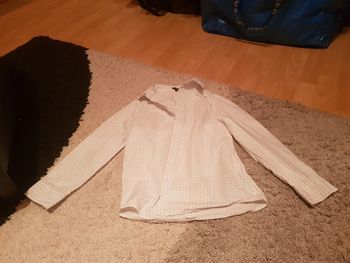 Chemise blanche avec motifs manches longues