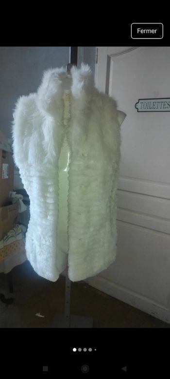Très belle veste sans manches f66