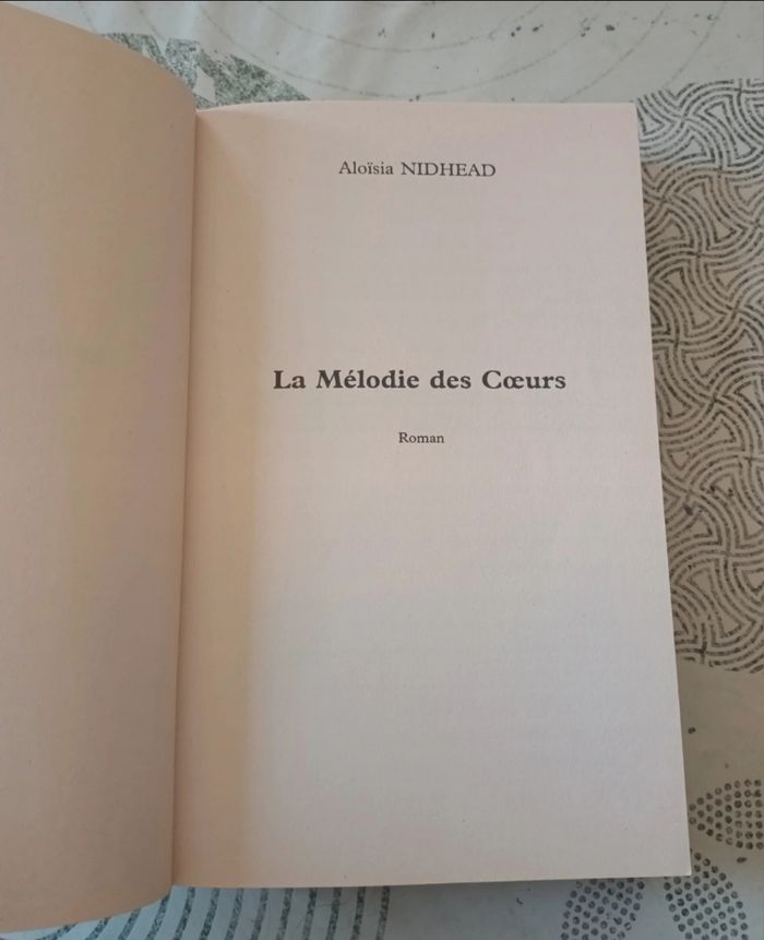 Livre " La Mélodie Des Cœurs " d'Aloïsia Nidhead 💙💐 - photo numéro 2