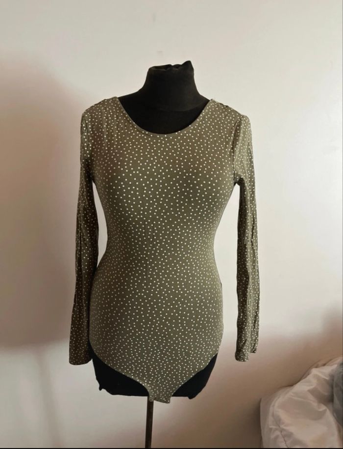 Bodies vert à pois taille S de chez Kiabi en très bon état
