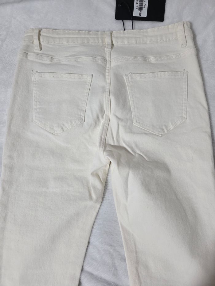 Jean patte d’éléphant blanc - photo numéro 9