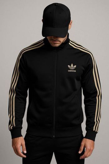 Veste Adidas originals noire et dorée