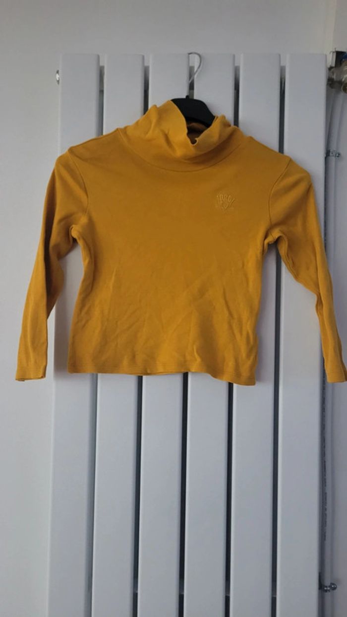 Pull col roulé