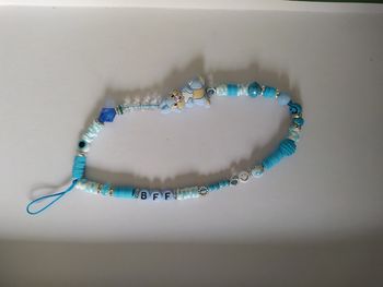 Bijoux telephone panpan bleu