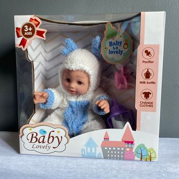 Poupon 25 cm avec accessoires 3 ans+
