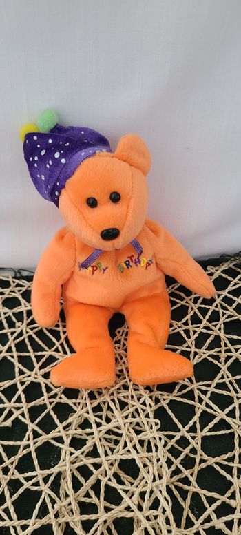 Joyeux anniversaire Ty Beanie Baby, l'ours orange