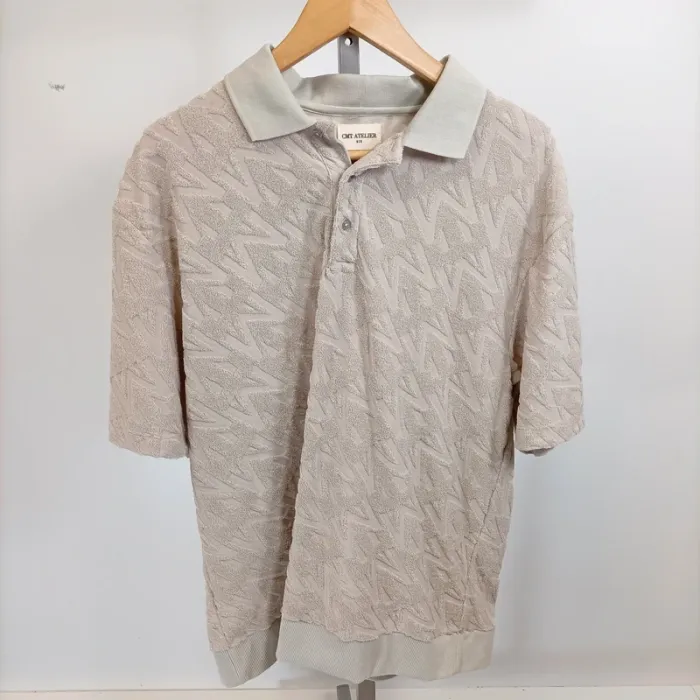 Polo stylisé polyester manches courtes col V à boutons couleur crème - CMT taille M A549