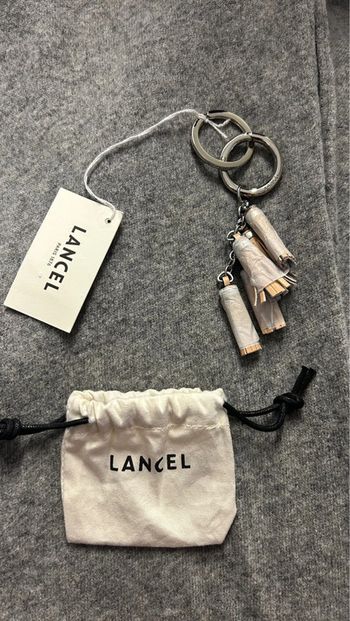 Porte-clés Lancel 5 mini pompons neuf / bijoux pour sac