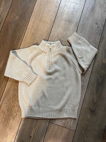 Pull col montant