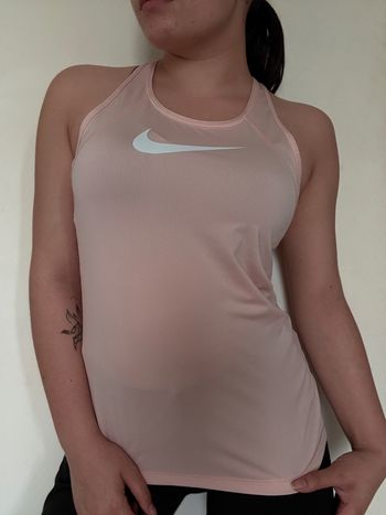Débardeur Nike Dri-Fit rose sport respirant