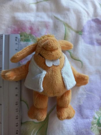 Petite peluche porte clé grande dents