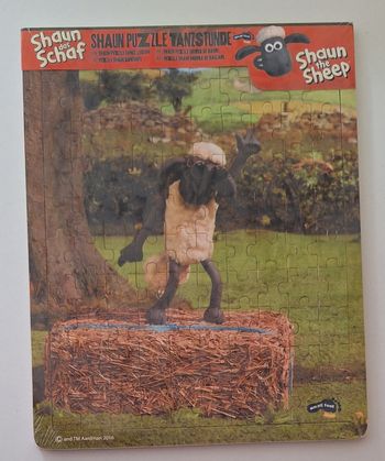 Puzzle neuf 100 pièces en bois Shaun le mouton