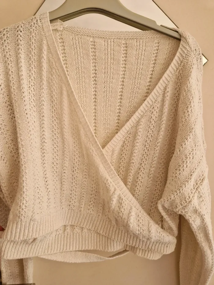 Pull crème croisé en tricot taille M