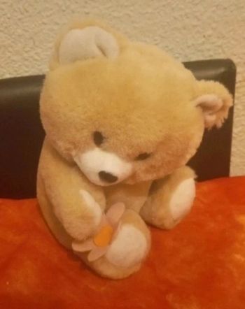 Ourson ours beige avec fleur