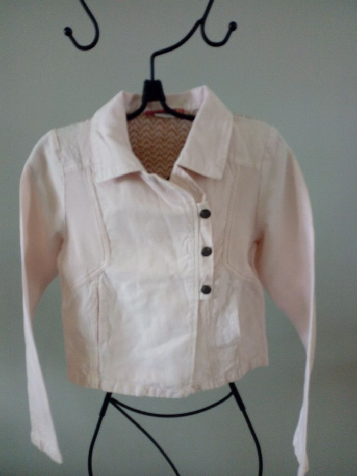 Jolie veste rose pâle