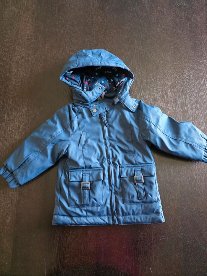 Manteau déperlant doublé en 23 mois