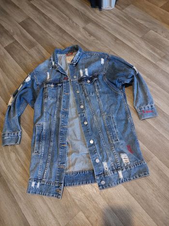 Veste longue en jeans troué taille s