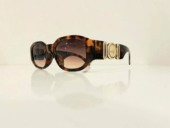 Lunette de soleil mixte marron écaille et dorée UV protection catégorie 3