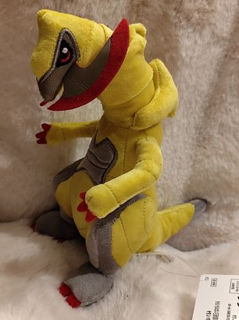 peluche pokémon tranchodon avec étiquette