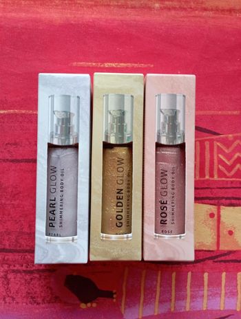 Lot 3 huiles pour le corps pailletées.