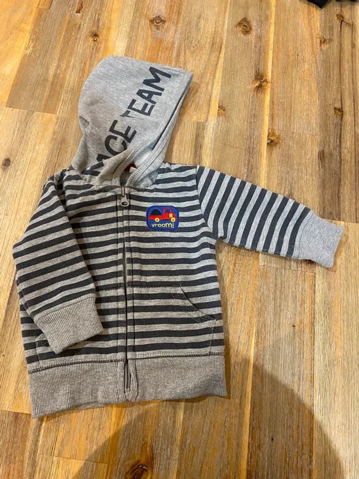 Veste zippé à capuche