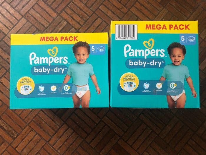 164  couches Pampers Neuves