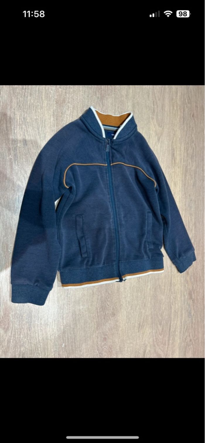 Veste à zip bleu marine à liseré marron 5 ans